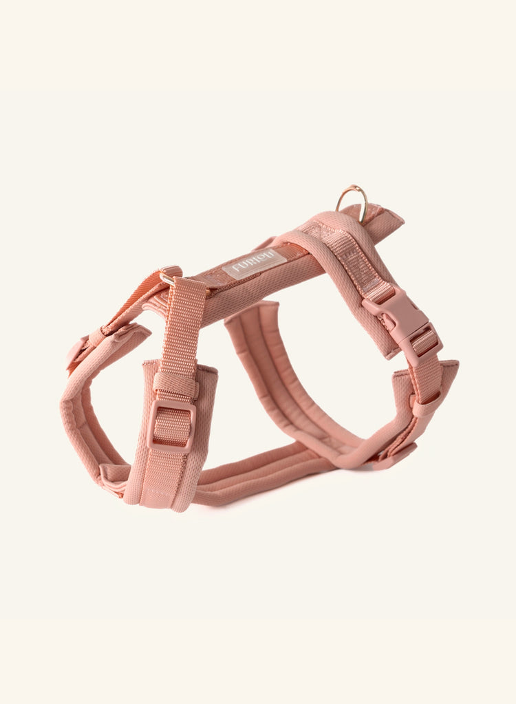 Pink dog harness from Furlou on a white background