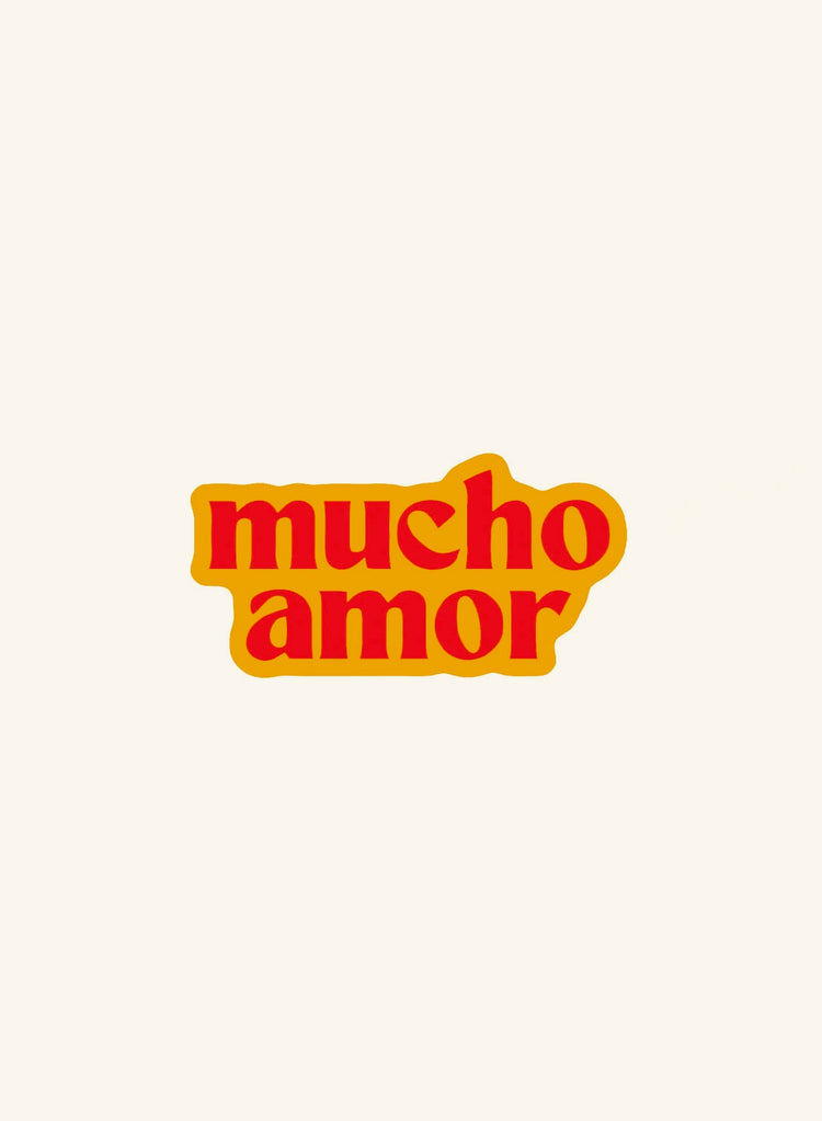 Text 'mucho amor' in red on a pins on a white background