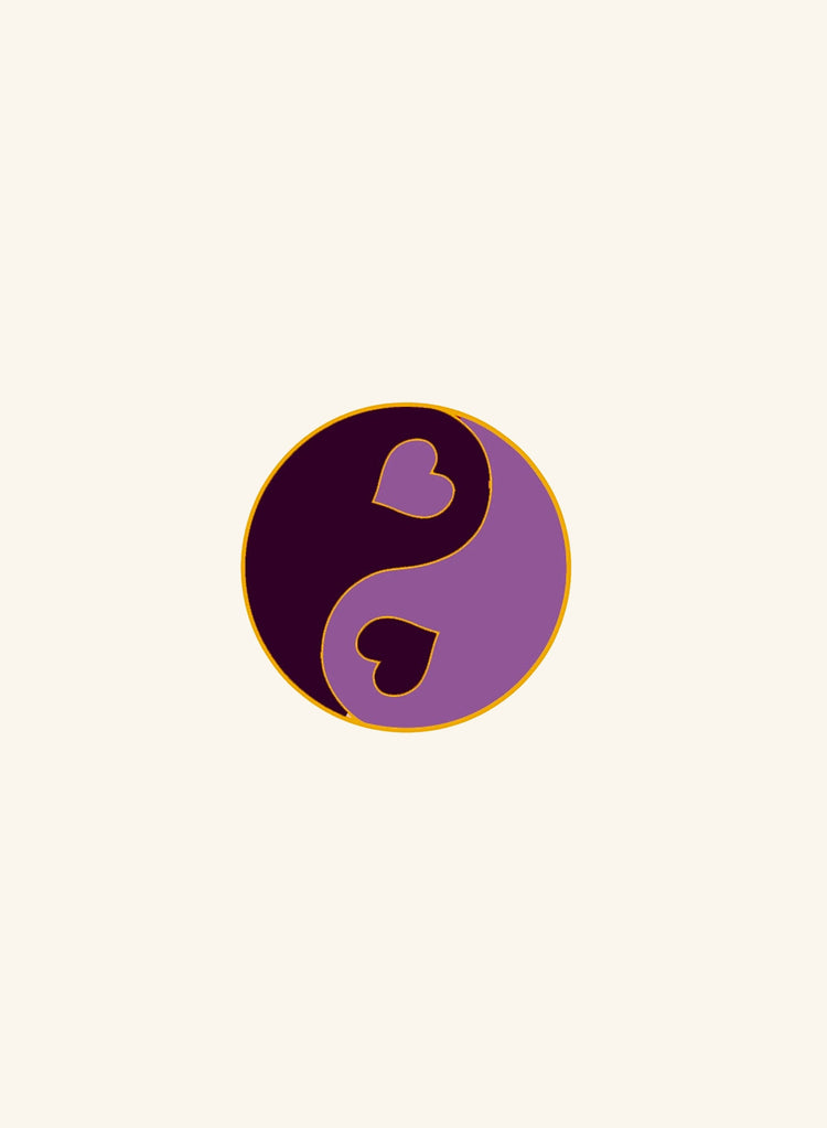 Yin yang symbol pins with a heart inside on a white background