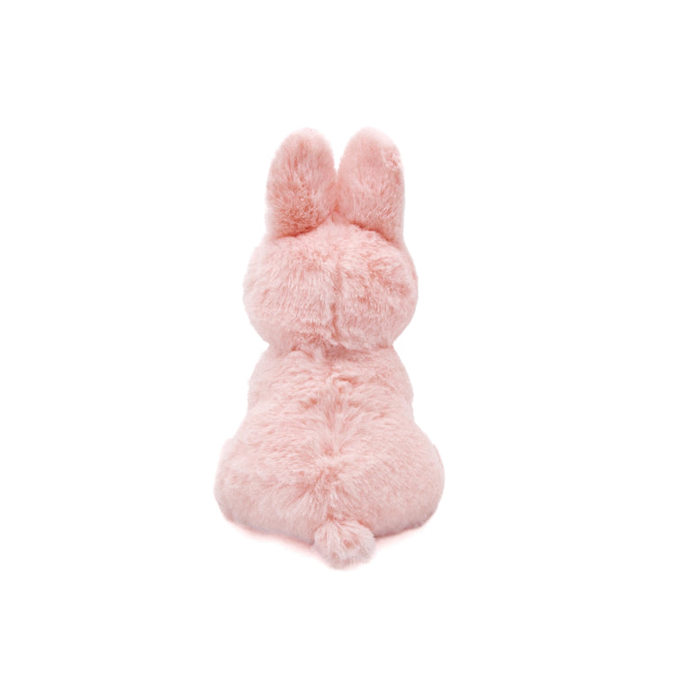 Pink plush bunny toy on a white background