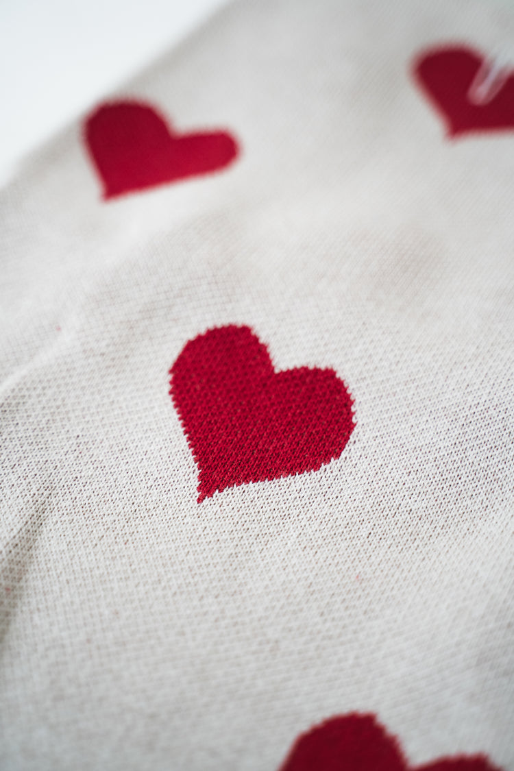 Knitted sweater with hearts