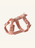 Pink dog harness from Furlou on a white background