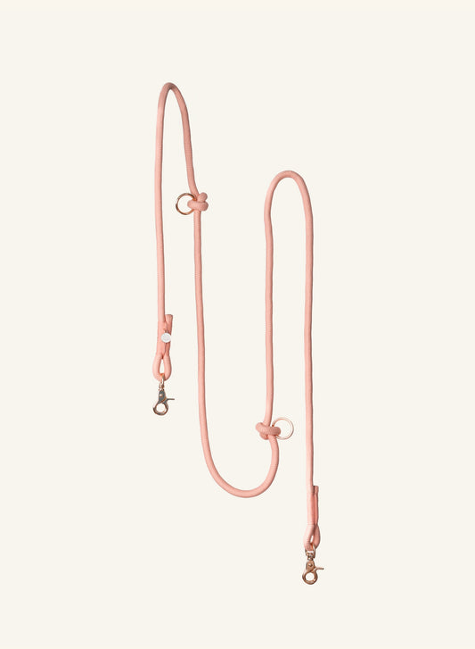Light pink Furlou leash on a white background